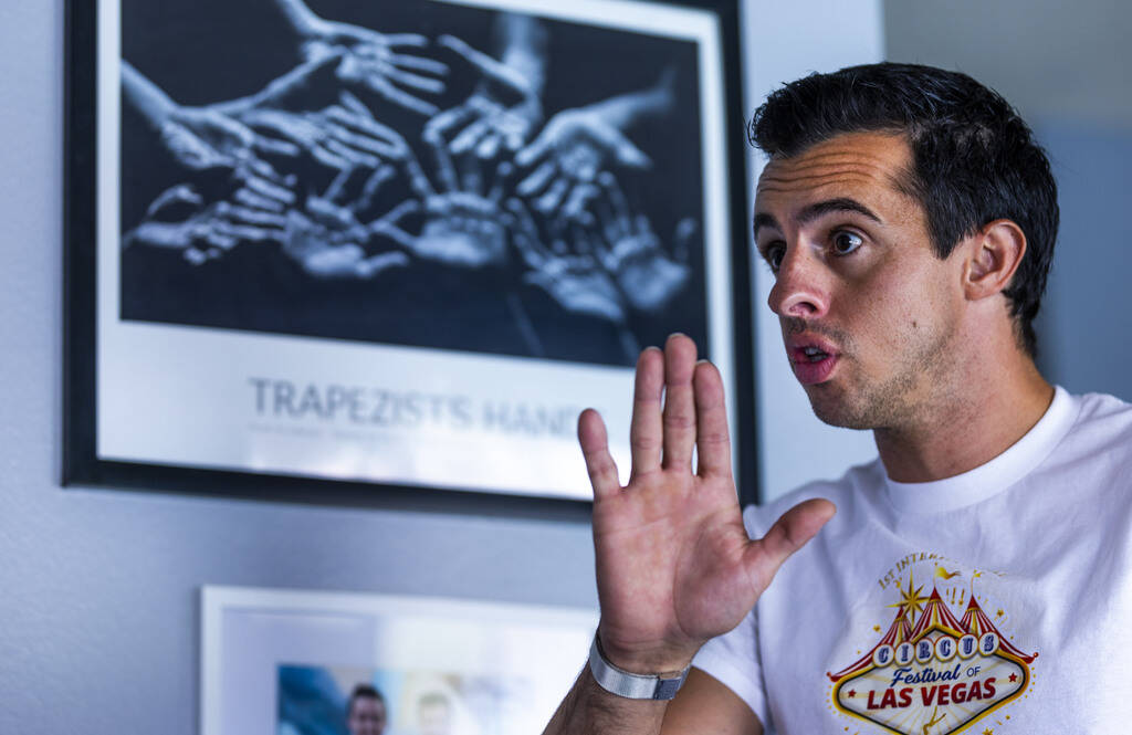 Renato Fernandes talks about the neighborhood response to his backyard trapeze on Saturday, Aug ...