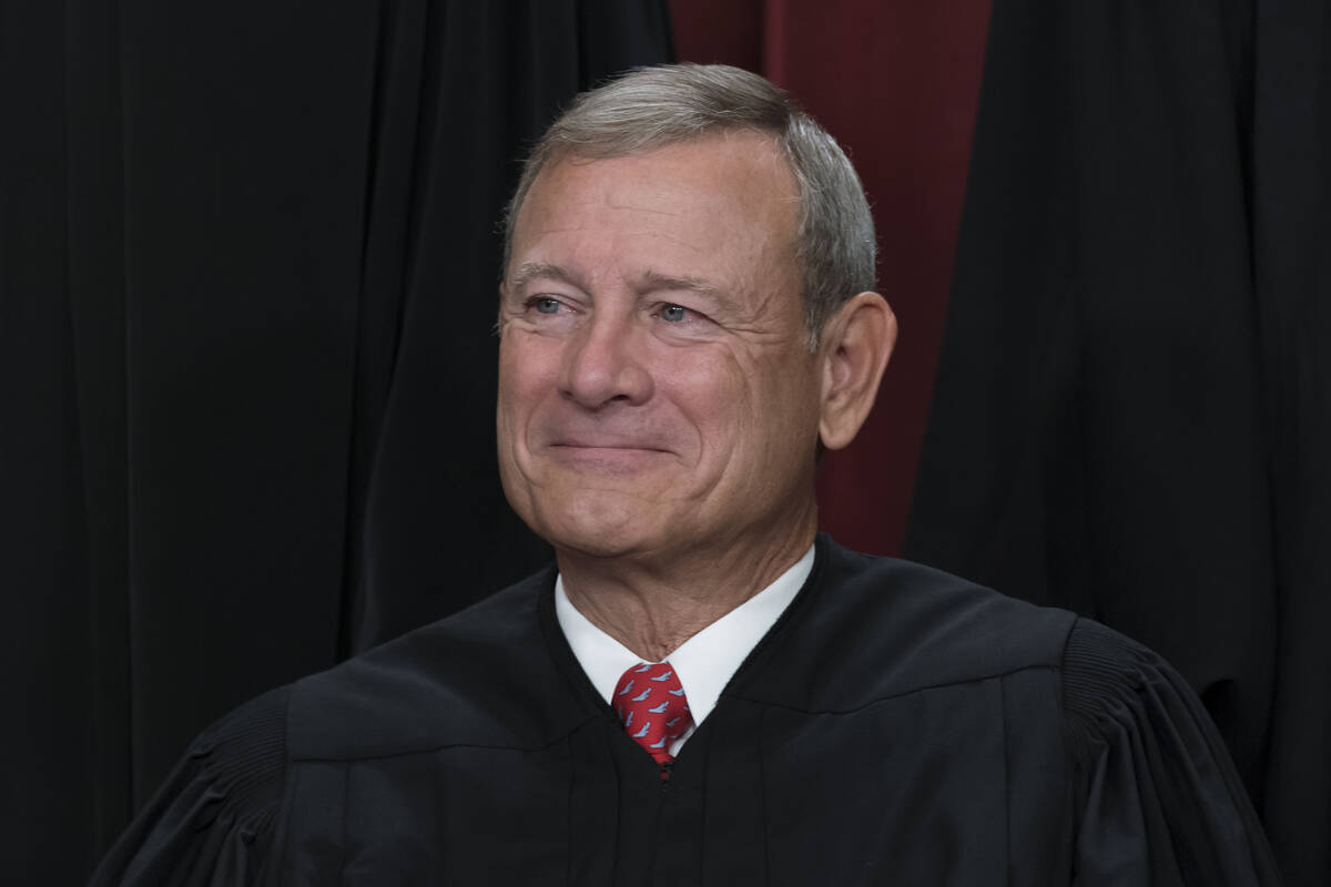 Chief Justice of the United States John Roberts joins other members of the Supreme Court as the ...