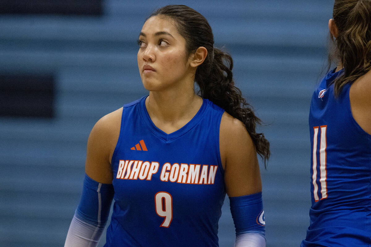 Bishop Gorman junior Trinity Thompson (9) prepares for the serve during the volleyball match ag ...