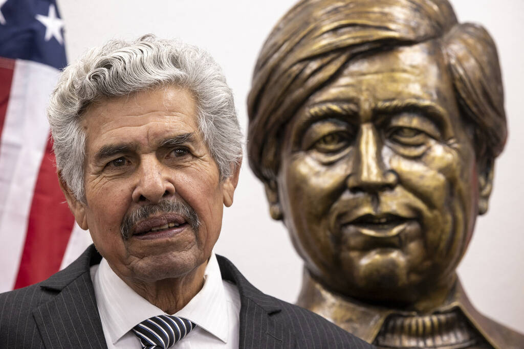 Artist Guillermo Salazar González stands in front of his newly unveiled bust sculpture of ...