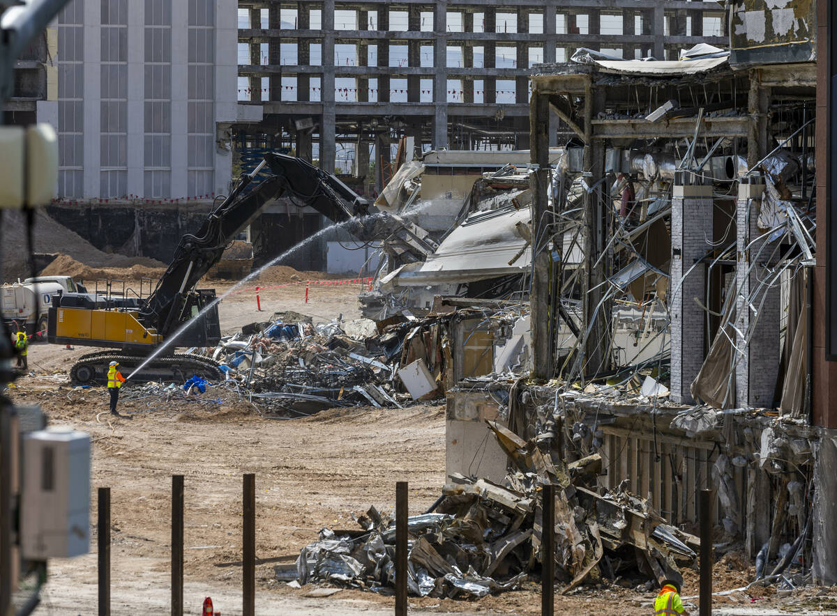 Machinery rips down some of the lower structures as the deconstruction of the Tropicana continu ...