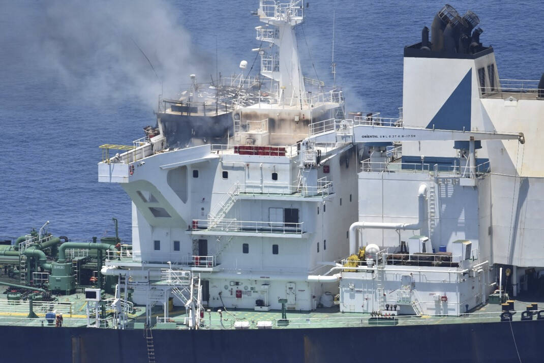 This photo released by the European Union's Operation Aspides shows fires burning aboard the oi ...