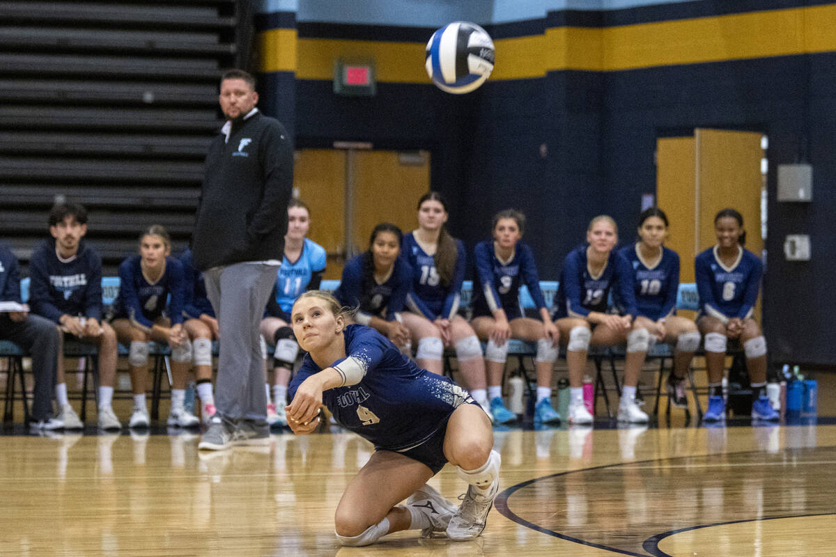 Foothill freshman Bryn Neibaur (9) receives the ball during the volleyball match against Bishop ...