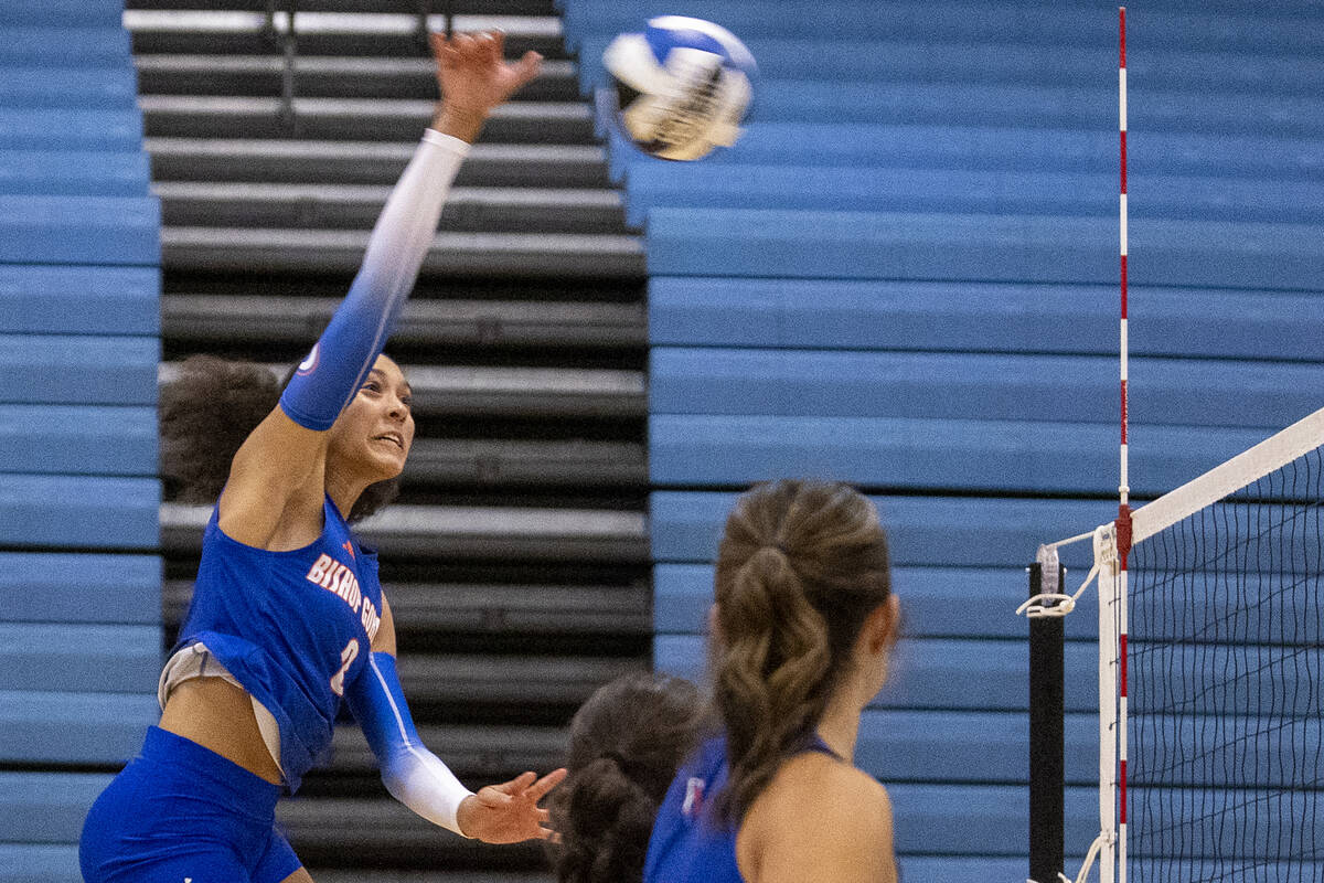 Bishop Gorman junior Ayanna Watson (8) spikes the ball during the volleyball match against Foot ...