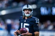 Raiders quarterback Gardner Minshew (15) looks to the stands as they face the Dallas Cowboys fo ...