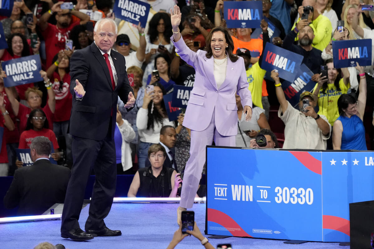 Democratic presidential nominee Vice President Kamala Harris, right, and running mate Minnesota ...