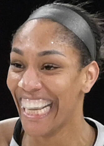 Las Vegas Aces center A'ja Wilson (22) smiles after scorning against the Washington Mystics dur ...