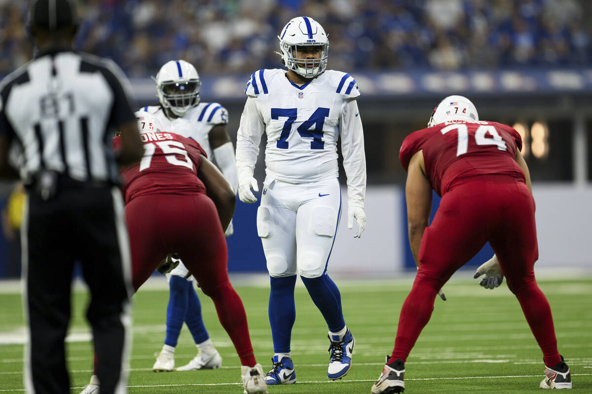 Indianapolis Colts defensive tackle Jonah Laulu (74) lines up on defense during an NFL football ...