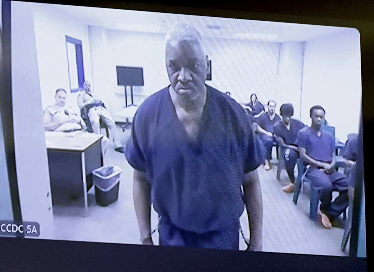 Oris Jones, accused of killing his father, appears in court via videoconference at the Regional ...