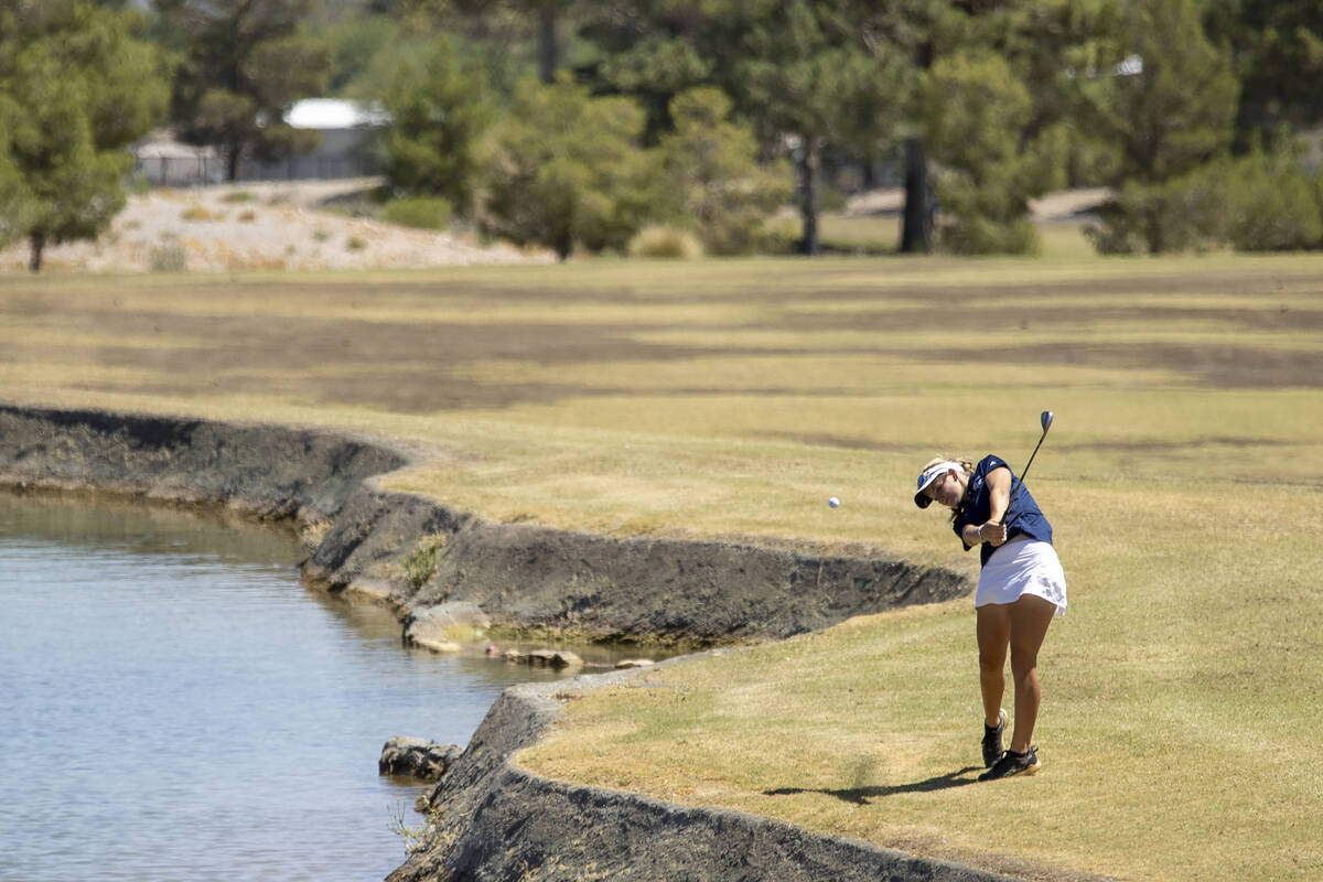 Shadow Ridge’s Ayvah Rossi competes during the Class 5A Mountain League girls golf match ...