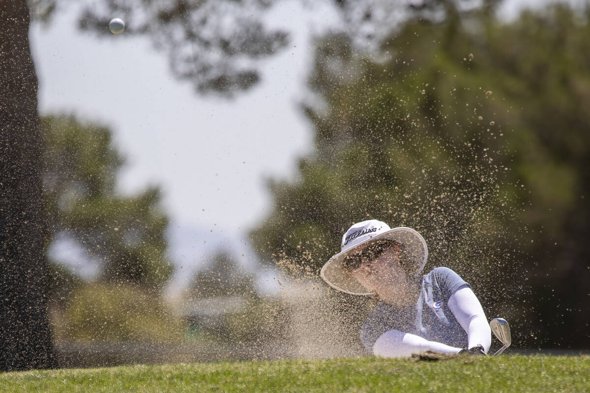 Bishop Gorman’s Samantha Harris chips her ball out of a bunker during the Class 5A Mount ...