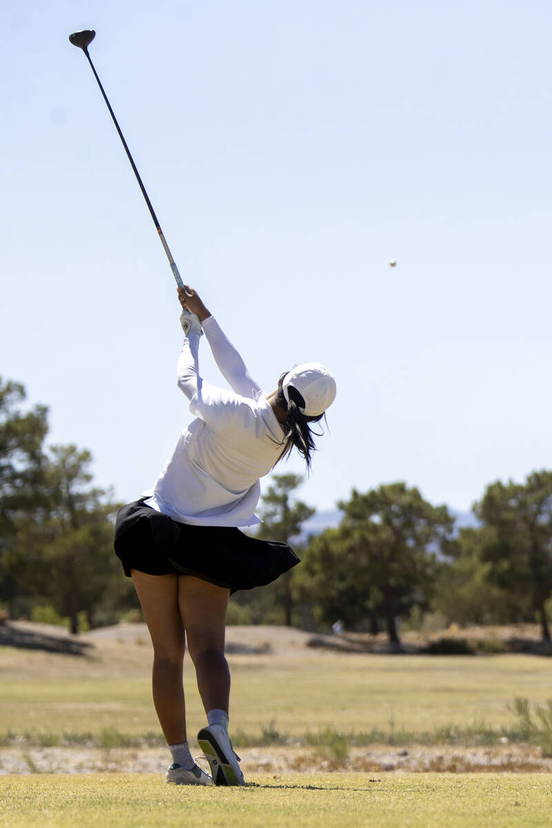 Clark’s Cydney Ha drives her ball down the fairway during the Class 5A Mountain League g ...