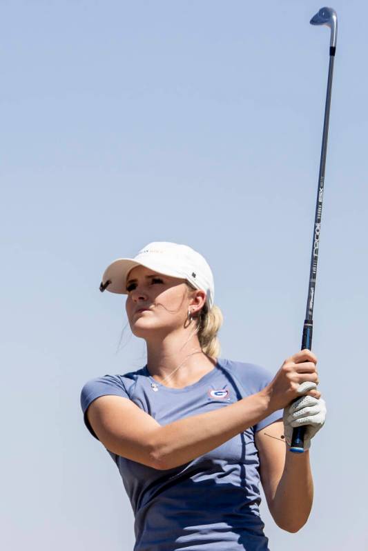 Bishop Gorman’s Moriah Wayman watches her ball fly down the fairway during the Class 5A ...