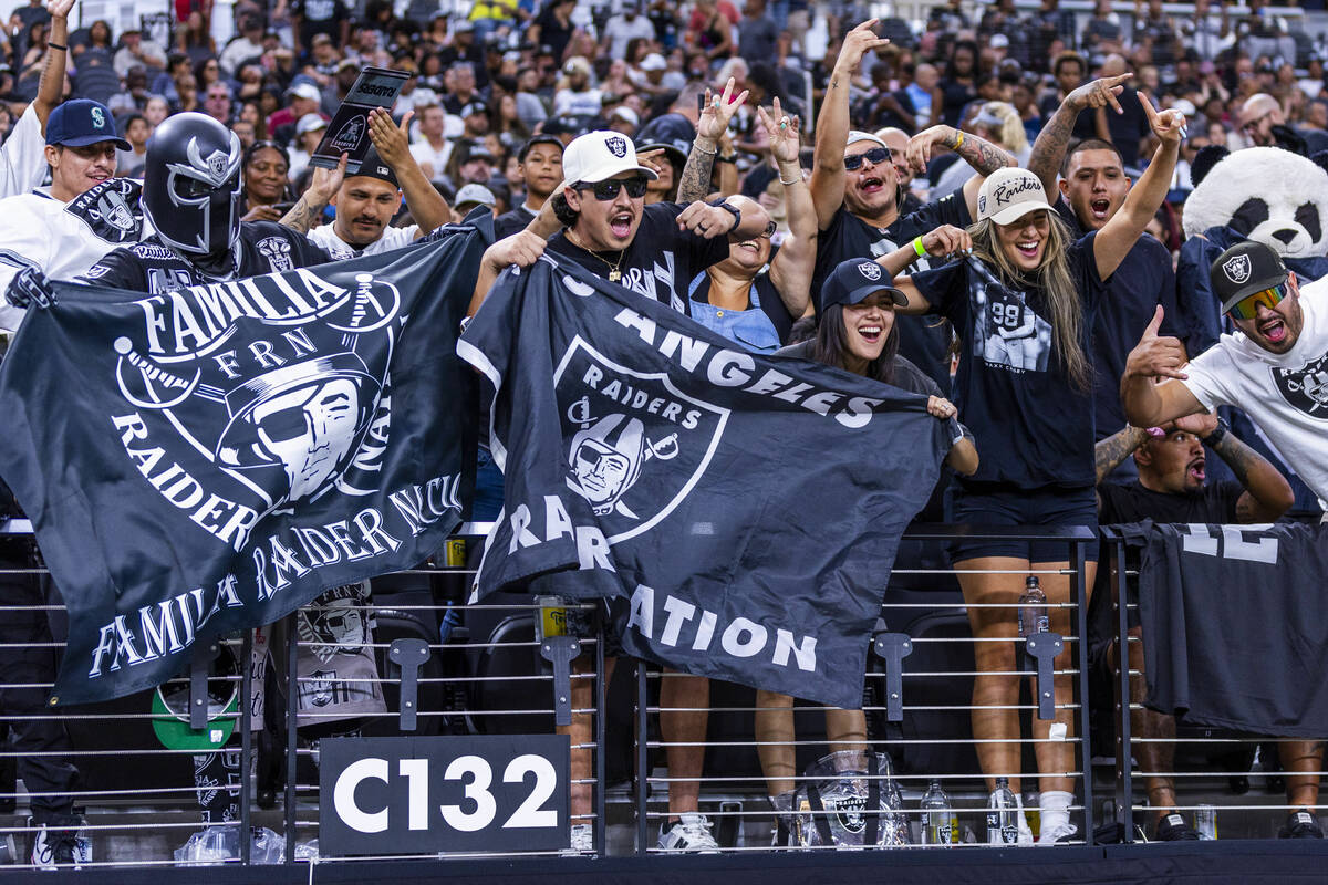 Raiders fans cheer for the team during an open practice at Allegiant Stadium on Tuesday, Aug. 2 ...