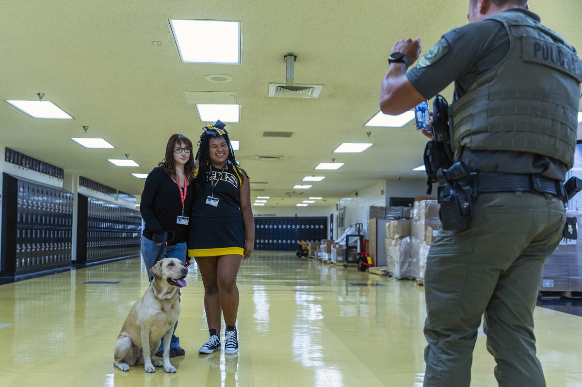 Clark High School students Jessie Granados and Leila Williams, both seniors, have a photo with ...