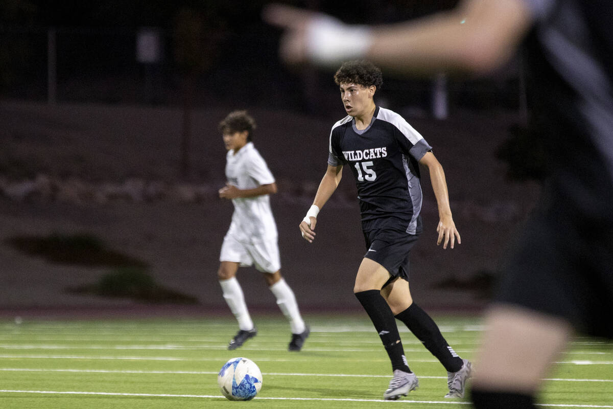 Las Vegas High junior Diego Vega (15) competes during the high school soccer game against Palo ...