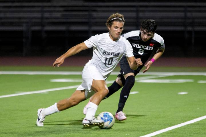 Palo Verde senior Francesco Traniello (10) attempts to keep the ball away from Las Vegas High s ...