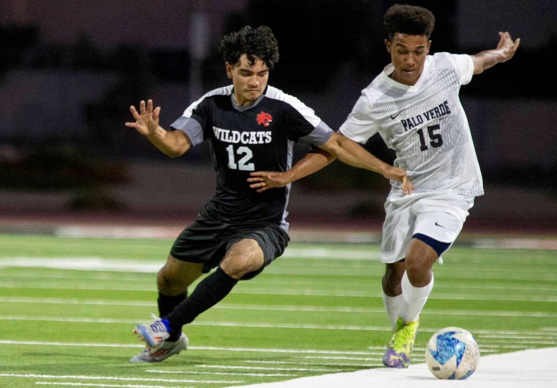 Las Vegas High senior Abraham Trujillo-Hinojosa (12) and Palo Verde senior Trevon Aytch (15) co ...