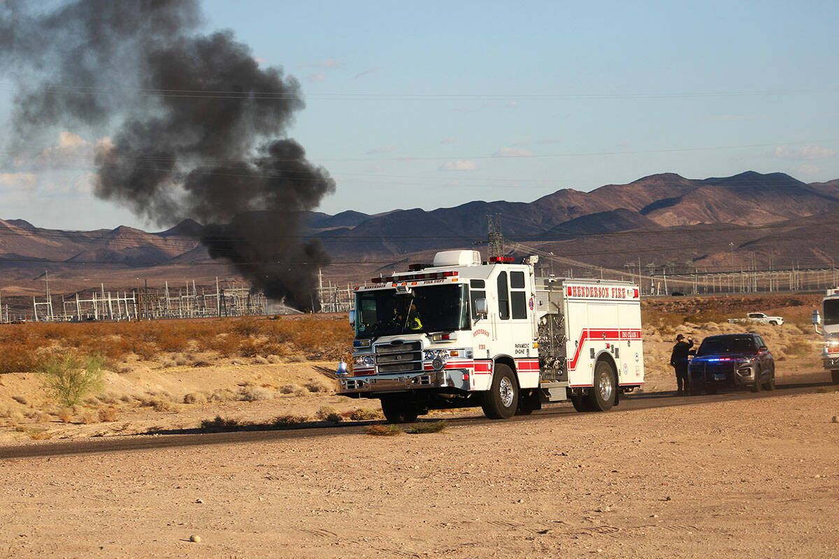 Fire crews work to extinguish a transformer fire near Interstate 11 on Thursday, Aug. 29, 2024, ...