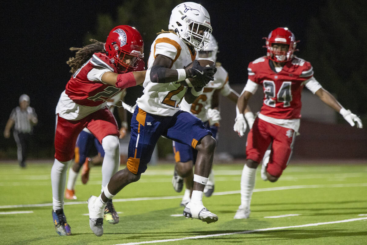 Legacy strong safety Orlando McCuin (27) runs with the ball during the Class 5A high school &#x ...