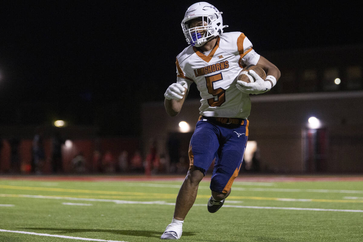 Legacy halfback Zaione Henderson (5) runs with the ball during the Class 5A high school &#x2018 ...