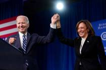 FILE - President Joe Biden and Vice President Kamala Harris stand on stage at the Democratic Na ...