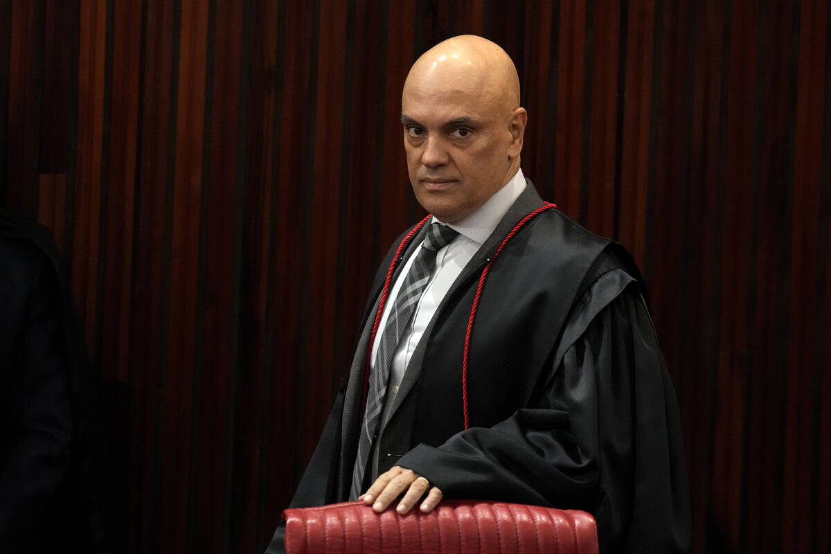 FILE - Brazilian Supreme Court Chief Justice Alexandre de Moraes arrives for a court hearing, i ...