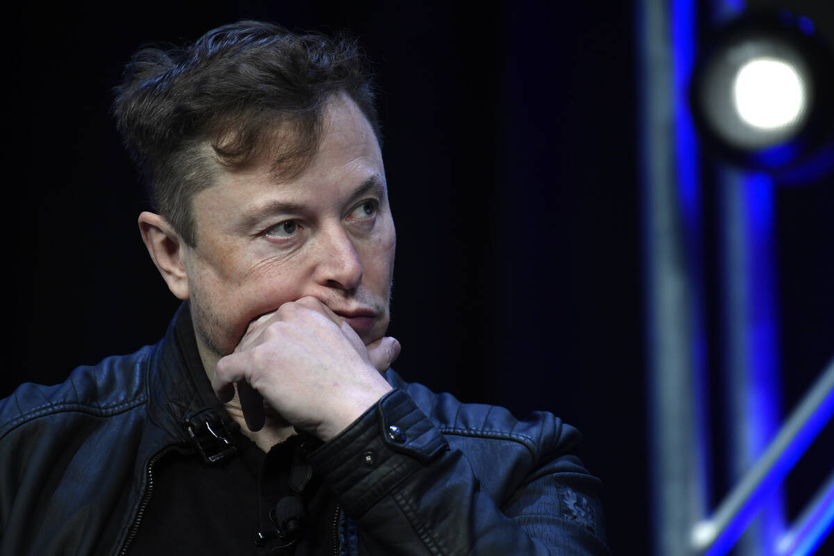 FILE - Tesla and SpaceX chief executive officer Elon Musk listens to a question as he speaks at ...