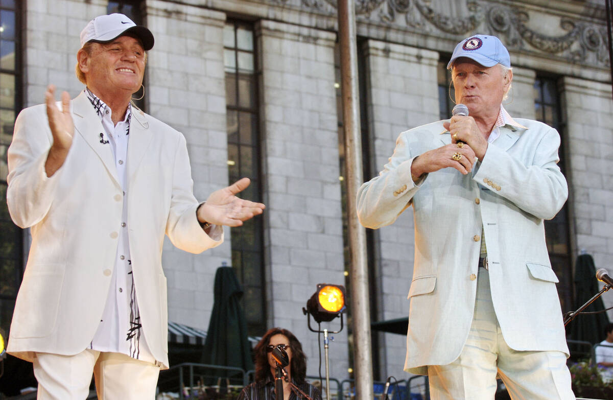 Beach Boys veteran Bruce Johnston, left, and founding member Mike Love perform on ABC's " ...