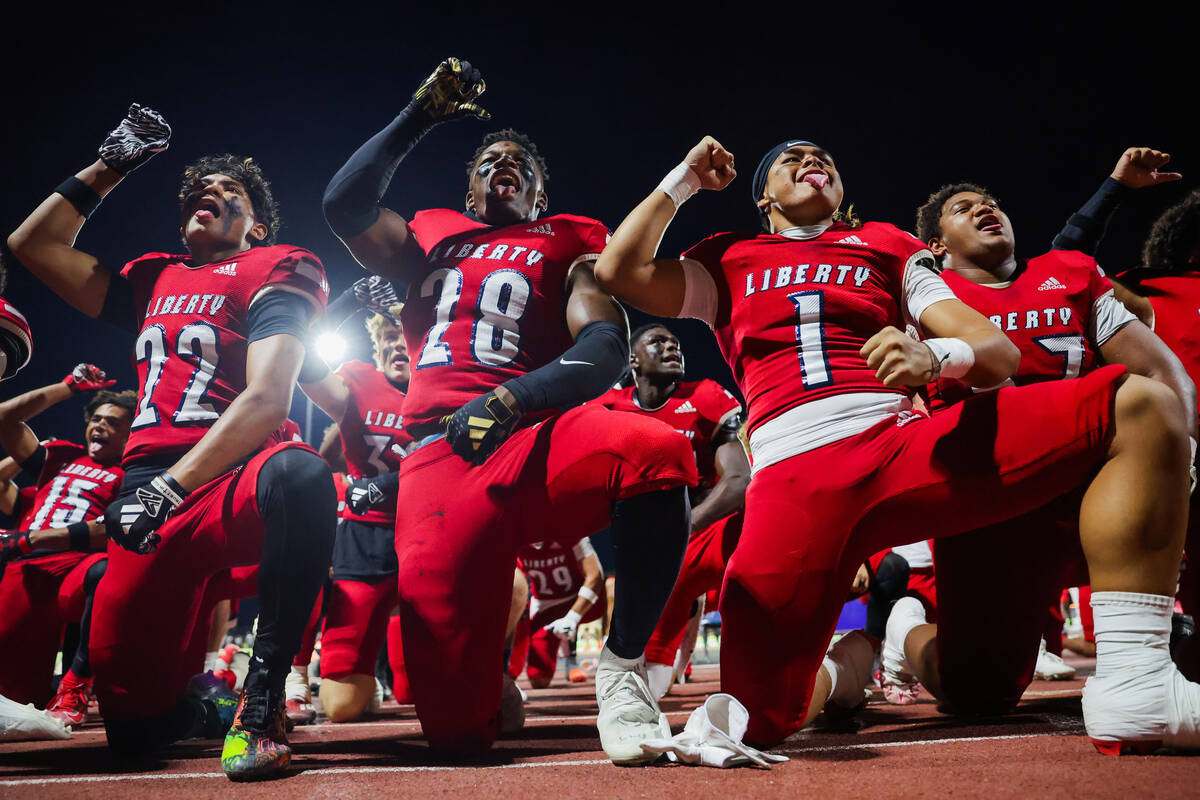 Liberty players perform a haka dance before a Ninth Island Classic football game between Milila ...