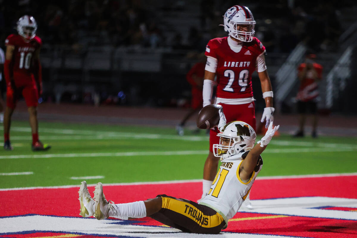 Mililani slotback Jaedon Pablo (21) celebrates a touchdown during a Ninth Island Classic footba ...