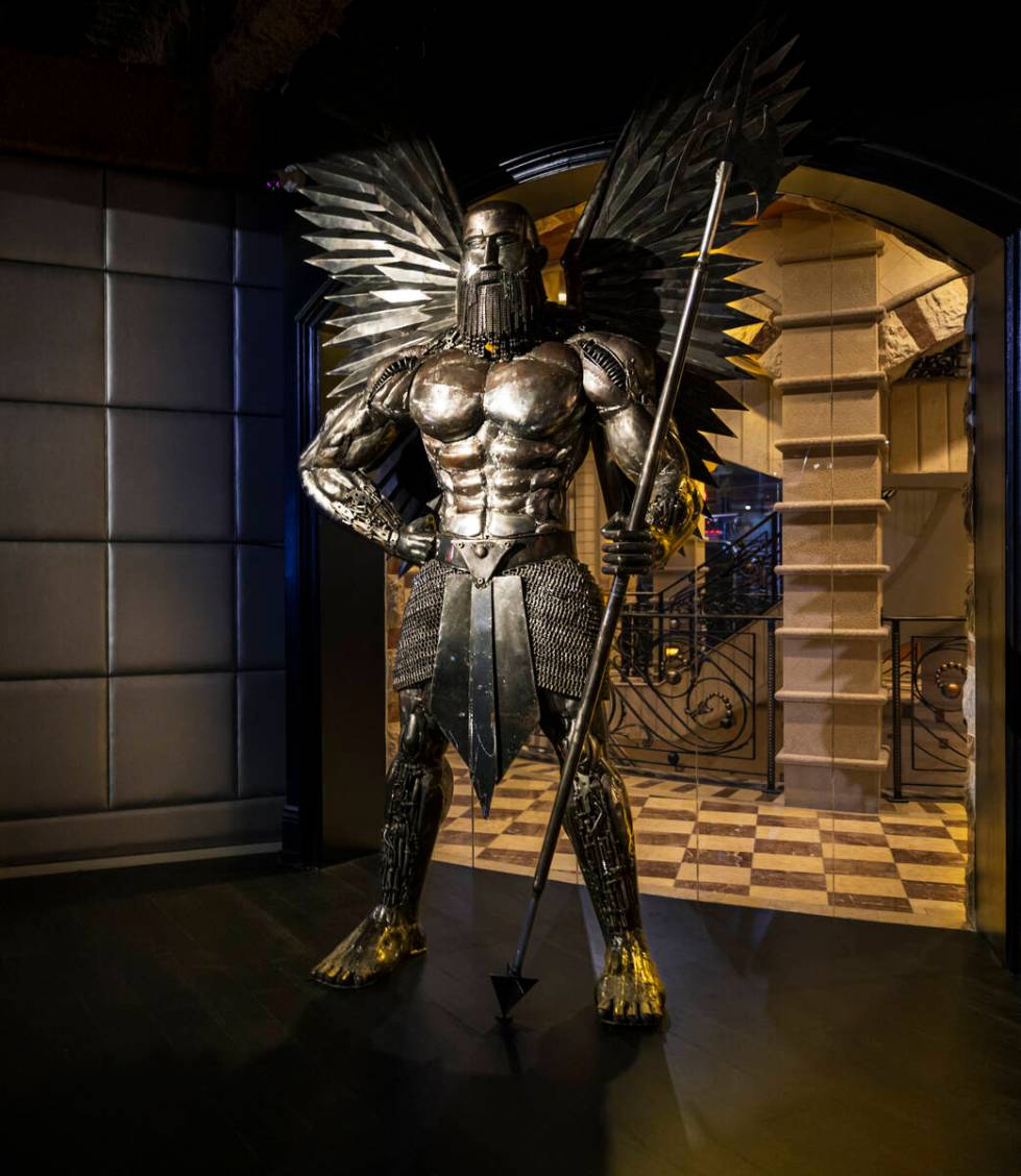 One of Kilo Club’s statues of warriors, made from scrap metal by artists in Thailand, keeps w ...