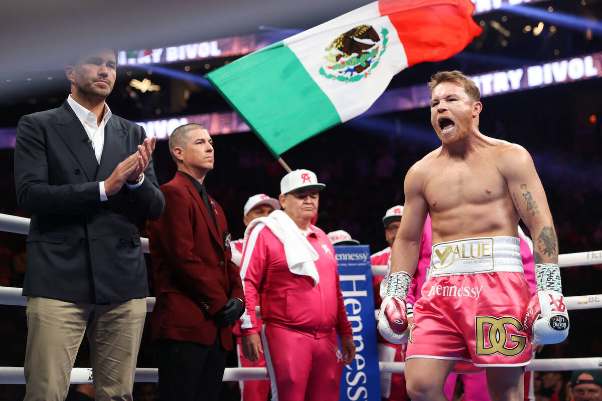 Saul “Canelo” Alvarez takes the ring for the WBA super light heavyweight title bo ...