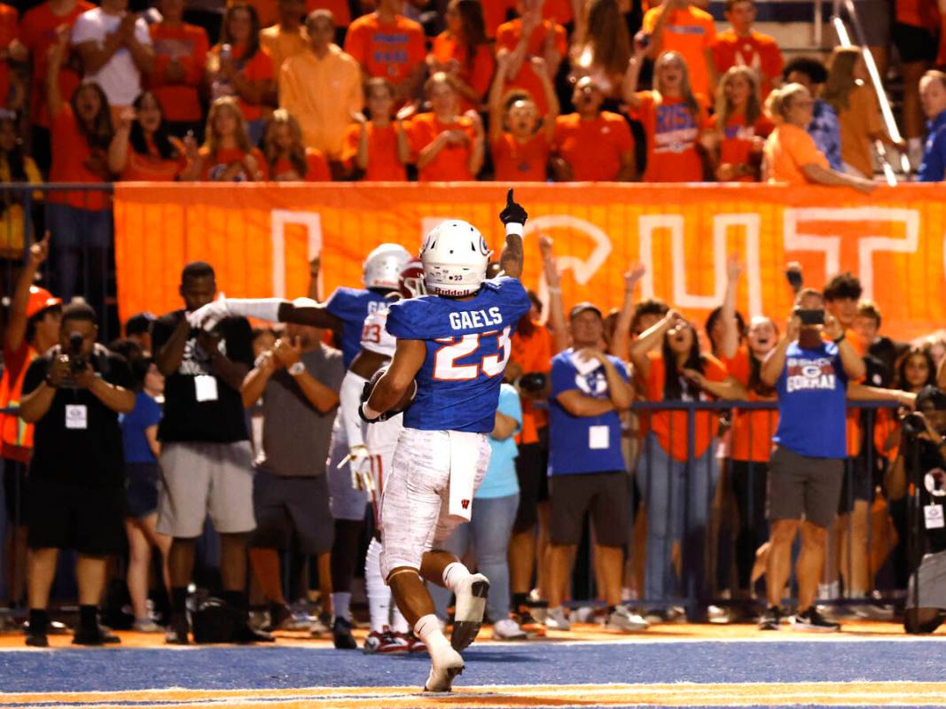 Bishop Gorman's wide receiver Trech Kekahuna (23) celebrates after scoring a touchdown during t ...