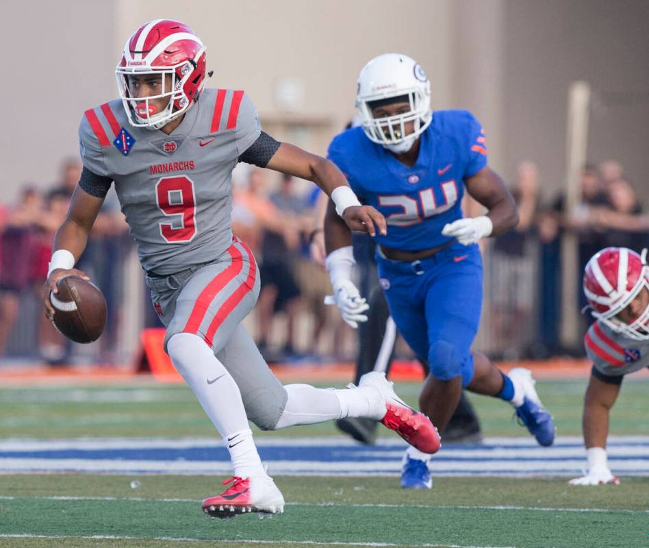 Mater Dei junior quarterback Bryce Young (9) sprints up field past Bishop Gorman junior linebac ...