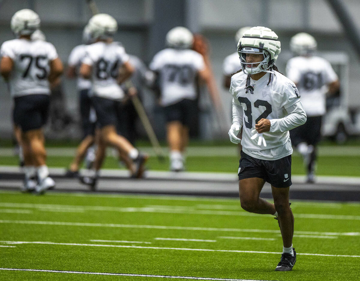 Raiders wide receiver Tyreik McAllister (32) runs to a drill during practice at the Intermounta ...