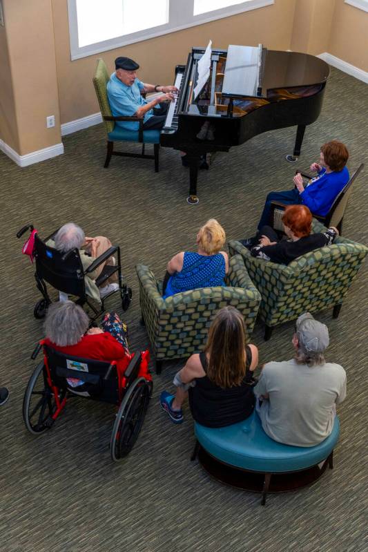 95-year-old pianist Don "Pops" Friend sings to his audience as he plays his finale at ...