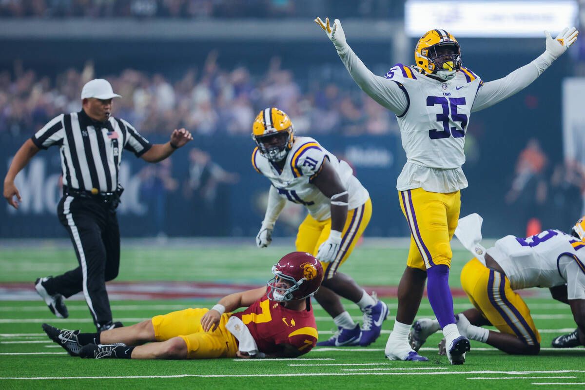 LSU defensive end Sai'vion Jones (35) celebrates tackling Southern California quarterback Mille ...