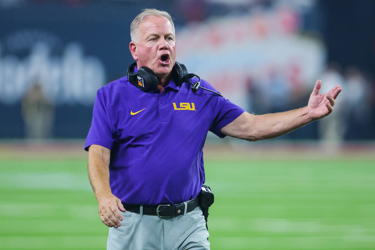 LSU head coach Brian Kelly yells to a referee during the Vegas Kickoff Classic NCAA football ga ...