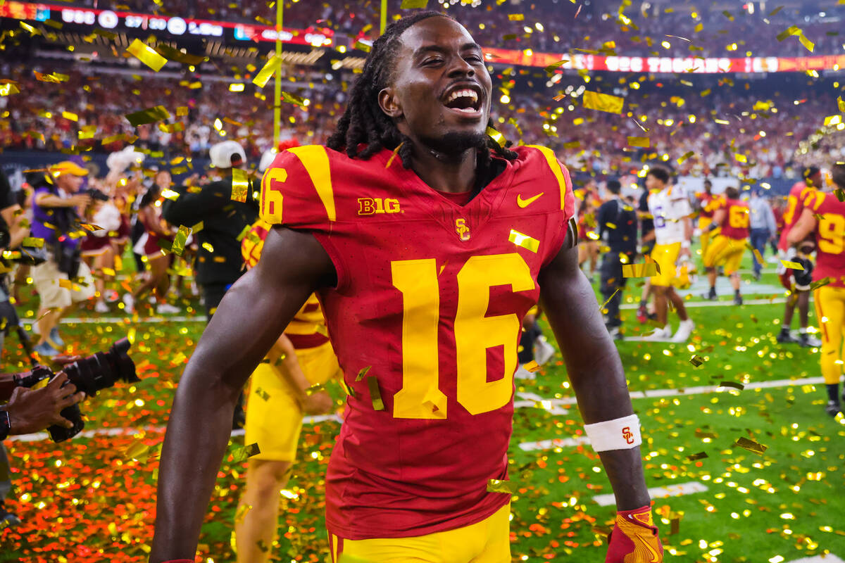 Southern California cornerback Prophet Brown (16) celebrates winning the Vegas Kickoff Classic ...