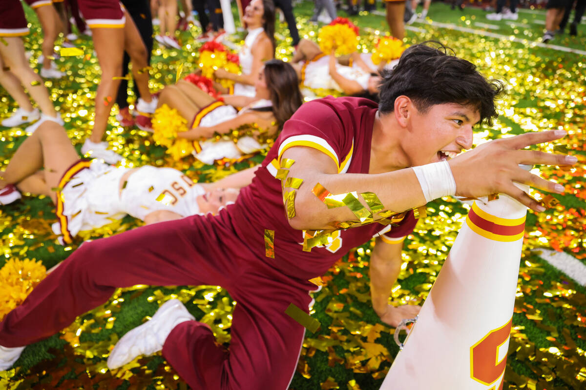 Southern California cheerleaders celebrate winning the Vegas Kickoff Classic NCAA football game ...