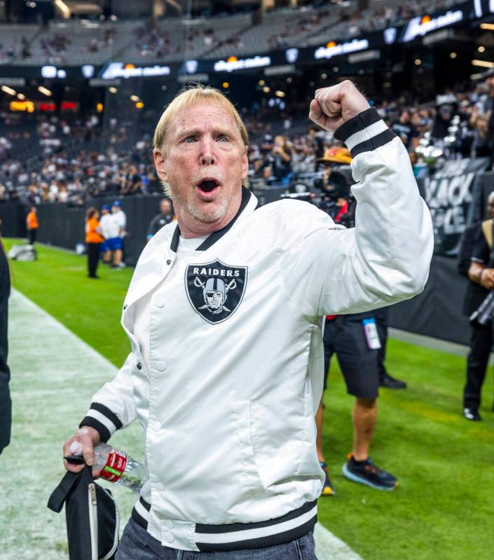 Raiders owner Mark Davis cheers with the crowd during warm ups before the first half of their N ...