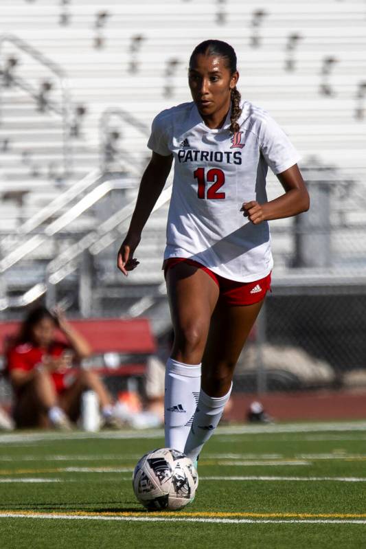 Liberty junior Ayva Jordan (12) competes during the high school girls soccer match against Arbo ...