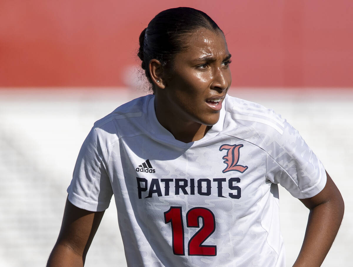 Liberty junior Ayva Jordan (12) competes during the high school girls soccer match against Arbo ...