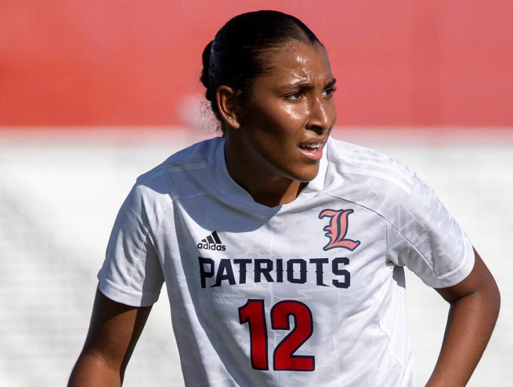 Liberty junior Ayva Jordan (12) competes during the high school girls soccer match against Arbo ...