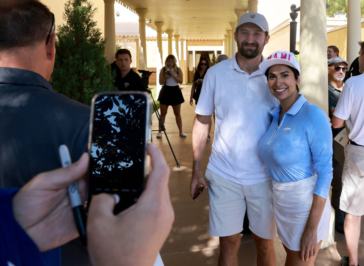 Vegas Golden Knights captain Mark Stone poses with Alejandra Aguilar during the 2024 VGK Golf C ...