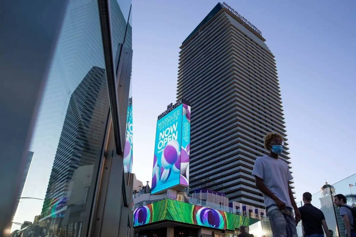 Strip visitors walk near The Cosmopolitan in June 2021. (Ellen Schmidt/Las Vegas Review-Journal)