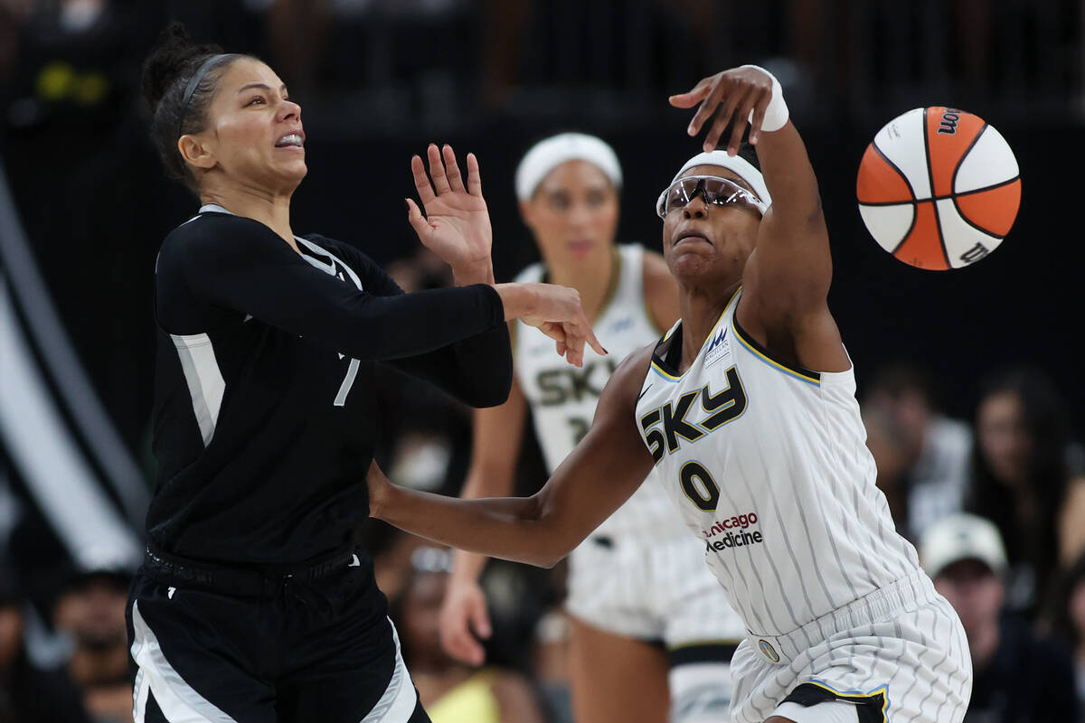 Chicago Sky guard Diamond DeShields (0) thwarts a pass by Las Vegas Aces forward Alysha Clark ( ...