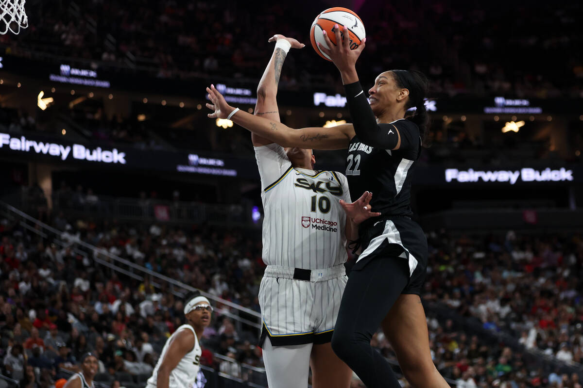 Las Vegas Aces center A'ja Wilson (22) shoots against Chicago Sky center Kamilla Cardoso (10) d ...