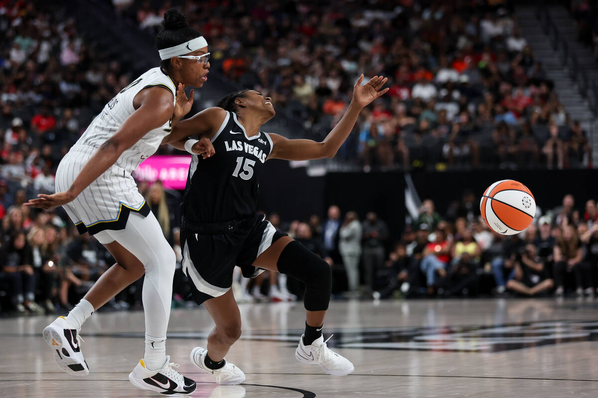 Las Vegas Aces guard Tiffany Hayes (15) loses control of the ball while Chicago Sky guard Diamo ...